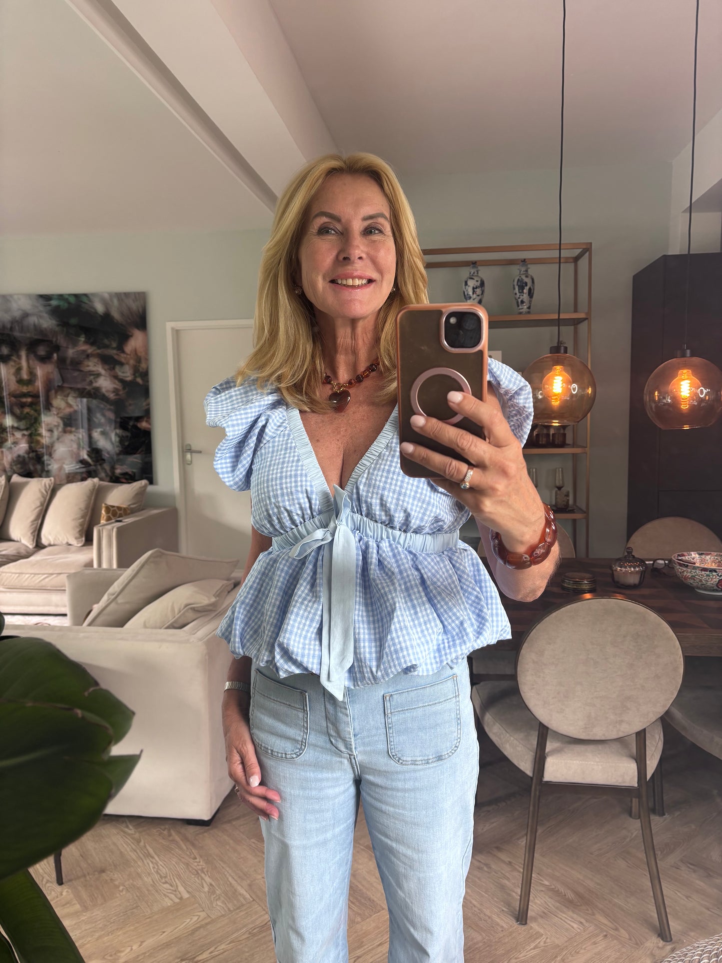 Licht blauwe ruit blouse