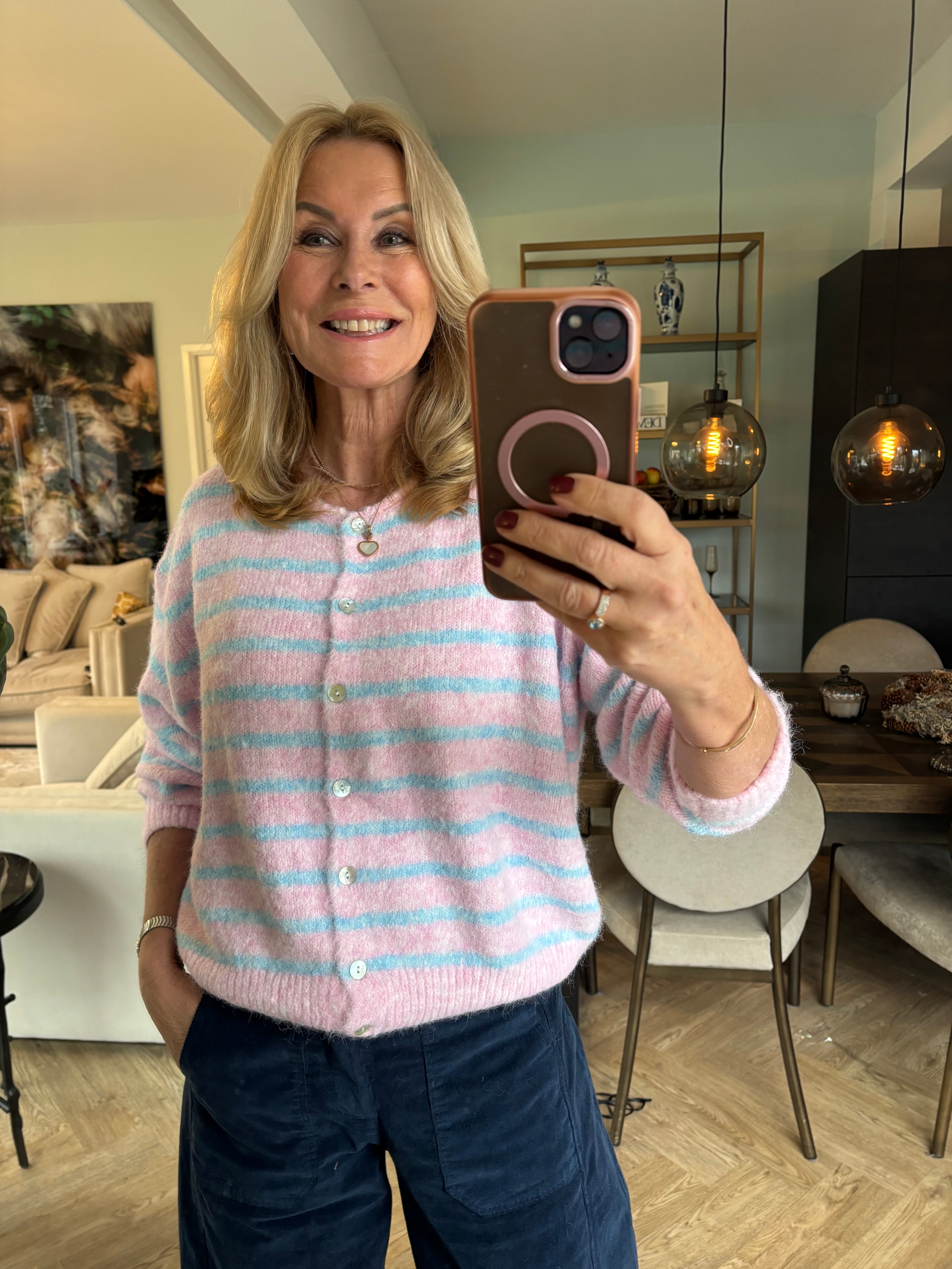 Veste roze met licht blauw streep