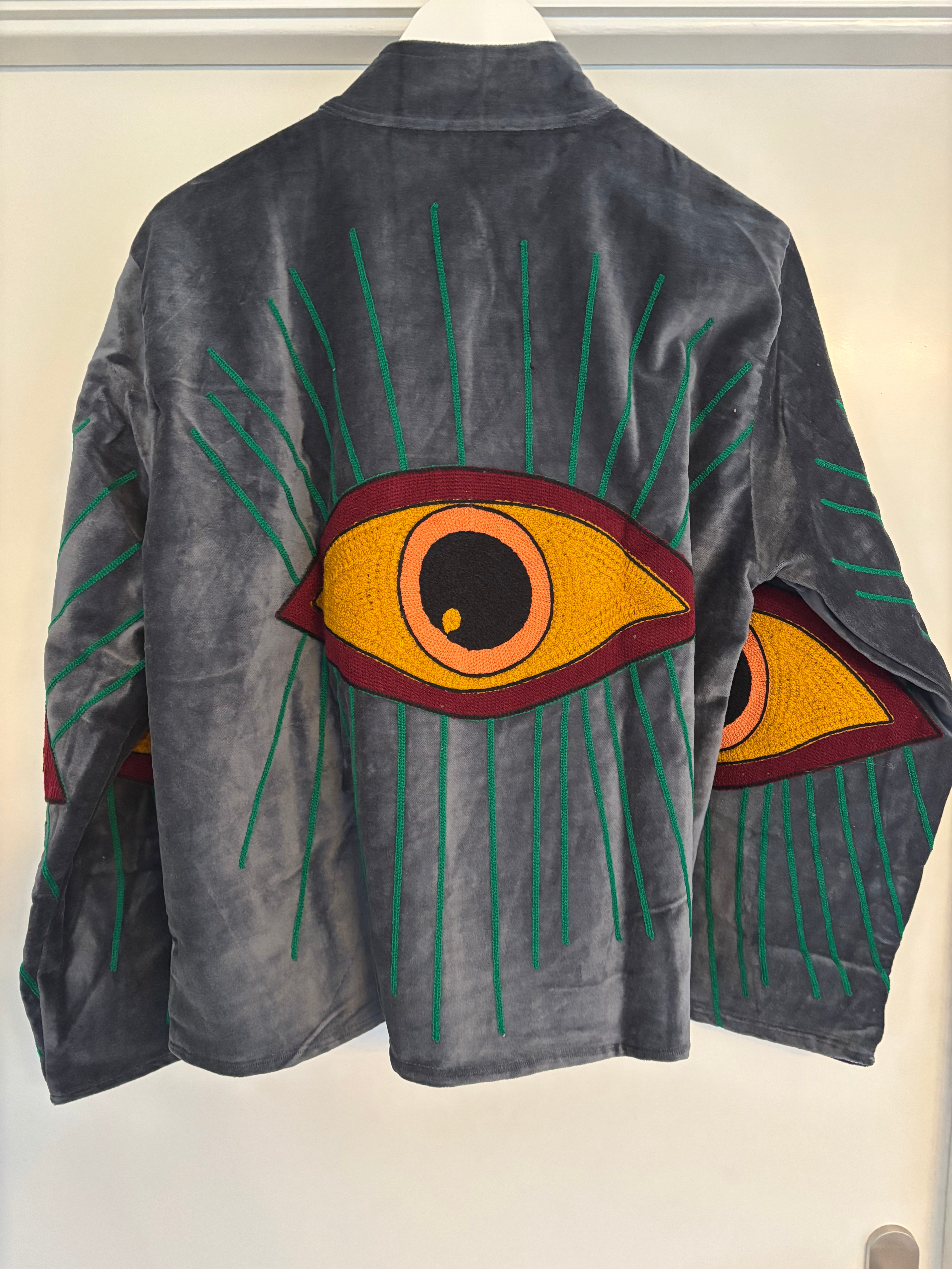 Jas velvet grijs oog oranje